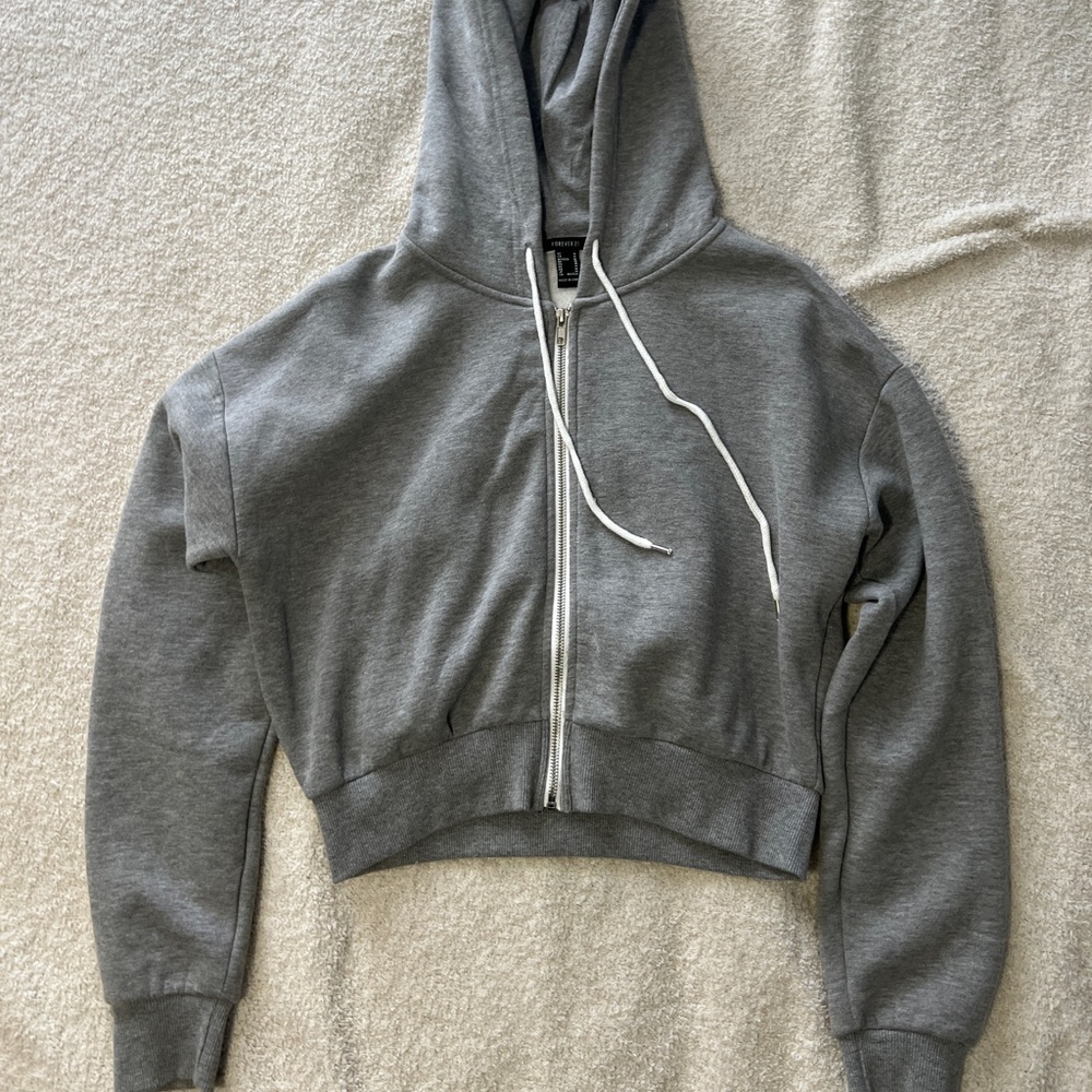 Cropped Grey medium forever 21 zip up hoodie. Worn a handful of times.